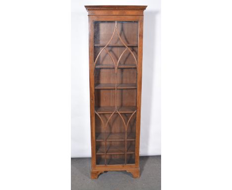 Victorian mahogany freestanding narrow bookcase, key and cavetto cornice, lancet glazed door enclosing six adjustable shelves