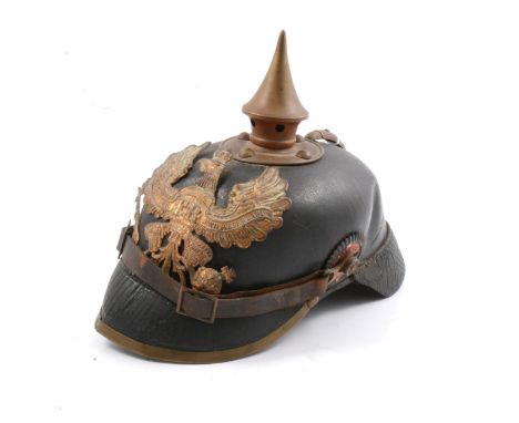 WW I German leather Pickelhaube helmet, brass eagle helmet plate "MITT.GOTT.FUR.KOENIG.UND.VATERLAND. stamped inside on leath