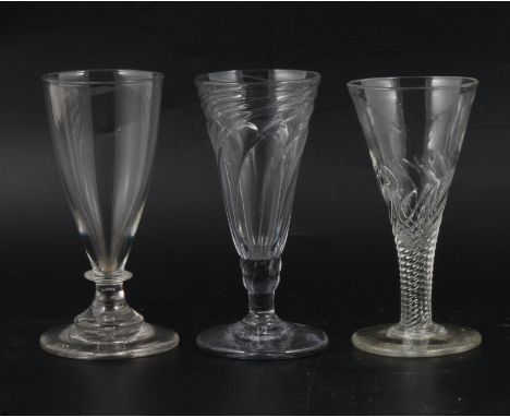 An ale flute, circa 1800, wrythen moulded pointed funnel bowl over a conforming double knop, slightly domed foot, 14cm; a nea
