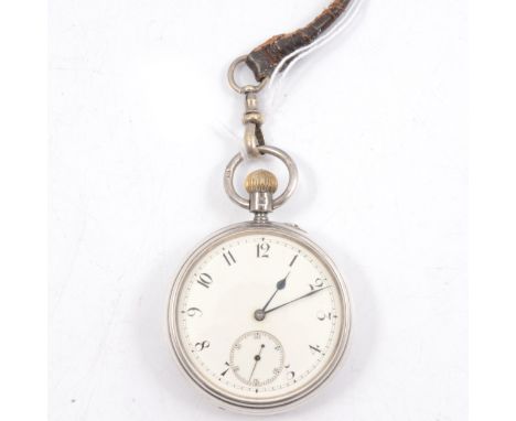 A silver open face pocket watch, white enamel dial with an arabic numeral chapter ring and subsidiary seconds dial in a silve
