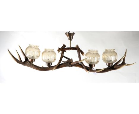 Antler: An Austro-German Red Deer Antler Ceiling Light Fitting, constructed from two Red Deer antlers with antler supports fo