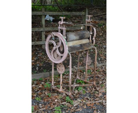 A VINTAGE EWBANK CAST IRON MANGLE (sd, woodworm)