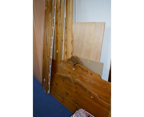 A PINE 5' FOUR POSTER BED FRAME, with a box of curtains and valances to fit