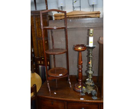 A MAHOGANY FOLDING CAKE STAND, a wooden ash tray and a table lamp (3)