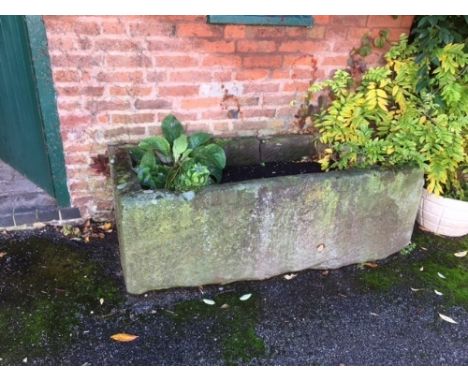 LARGE SANDSTONE TROUGH (damaged) 148cm x 72cm x 53cmTHE FOLLOWING LOTS NO.957-981 ARE OFF SITE AND CAN BE VIEWED TUESDAY 3RD 