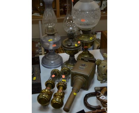 A PAIR OF G.W.R. BRASS CARRIAGE LAMPS, complete with shades, reservoir, vent cap and bracket copper, G.W.R. plaque to front, 