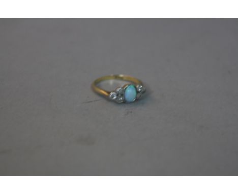 AN EARLY 20TH CENTURY OPAL AND DIAMOND DRESS RING, estimated old eight and old Swiss cut diamond weight 0.12ct, ring size K1/