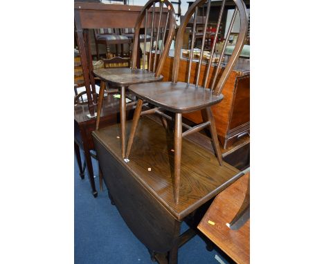 AN OAK GATELEG TABLE, and four hoop back Ercol chairs (5)