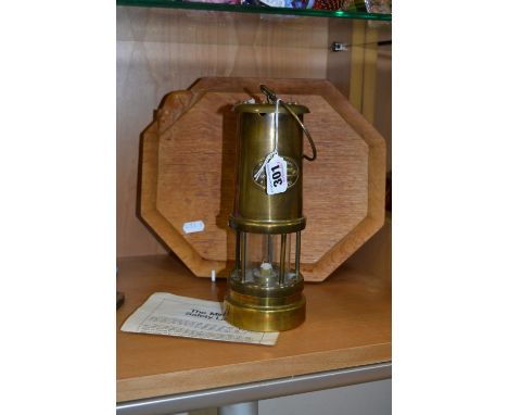 A BRASS MINERS LAMP (with instructions), together with a 'Mouse' cheeseboard (2)
