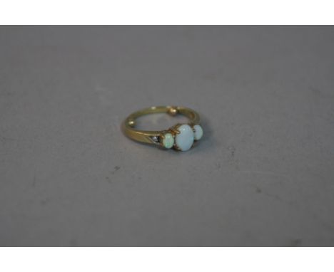 A LATE, 20TH CENTURY OPAL AND DIAMOND RING, ring size approximately K, sizing shots inserted to the shank, gross weight appro