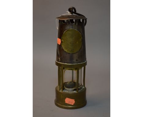 A BRASS MINERS LAMP