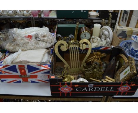 TWO BOXES OF METALWARE, Cherub ornaments, mahogany cased mantel clock, etc and a box of table linen (3 boxes)