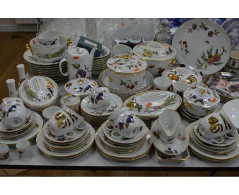 A QUANTITY OF ROYAL WORCESTER EVESHAM PATTERN OVEN TO TABLE WARES, including flan dishes, seven various covered serving dishe