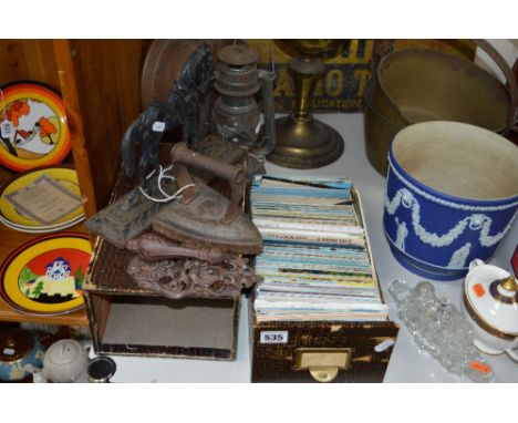 A SMALL COLLECTION POSTCARDS, topography etc, a cast door stop, an iron and a door knocker