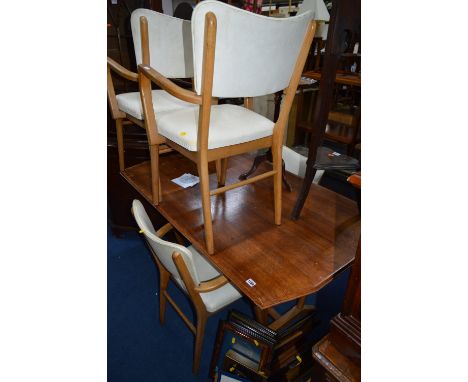 A RETRO LIGHT OAK DINING SUITE, comprising of table, four leatherette elbow chairs and sideboard with three drawers over two 