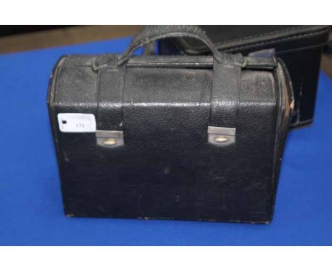 CASED TRAVEL SET
with Polaroid camera 