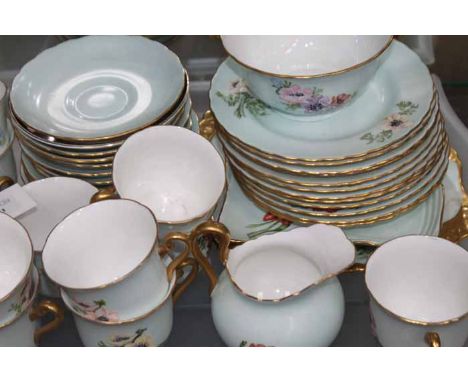 CIRCA 1930s HAND-PAINTED TUSCAN FINE BONE CHINA TEA SERVICE
decorated with flowers in pink and purple on a pale blue ground, 