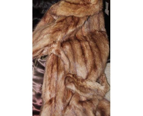TWO LADIES FUR JACKETS
including a brown Russian squirrel, a light brown musquash example and a fur stole (3)