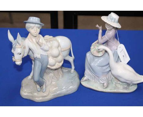 LLADRO FIGURE OF A GIRL AND A GOOSE
together with Valencia figure of a boy with a donkey, larger 25cm high
