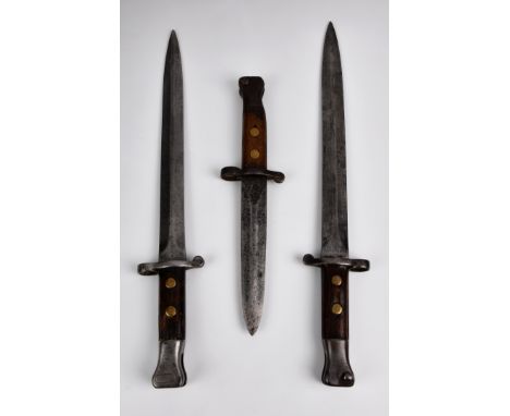 Three British 1888 pattern bayonets one cut down to make a fighting knife, unmarked, blade measuring 6 ¼in., one stamped Wilk