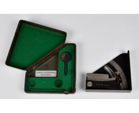 A WWII German Army Winkelmesser 35 (Artillery Field Clinometer) range finder W.M.35 (1/6400) with original key, housed in met