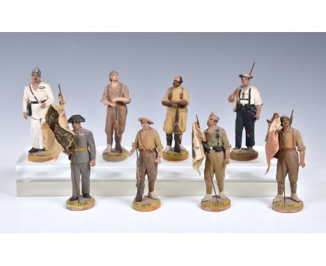 An unusual collection of eight Spanish Civil War figurines,&nbsp;1930s, in painted terracotta, each stamped to base 'J. Rado 