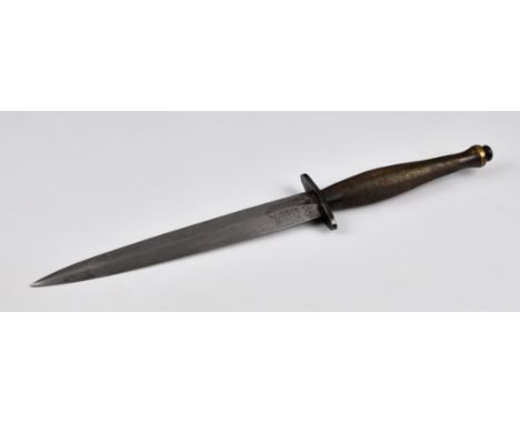 A WWII 2nd pattern Fairbairn-Sykes Commando fighting knife with double edged spear point blade, the ricasso with etched panel