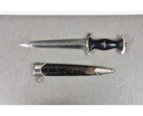 Guernsey German Occupation interest - A German SS Officers dagger the double edged steel blade stamped RZM over 1211/38 and S