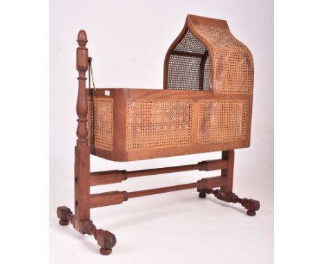Heal &amp; Son, London - a Victorian 19th century mahogany framed &amp; cane rattan rocking cot crib. The child's cradle in m