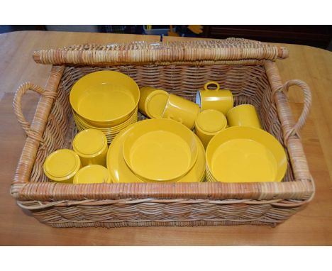 A wicker hamper and picnic set
