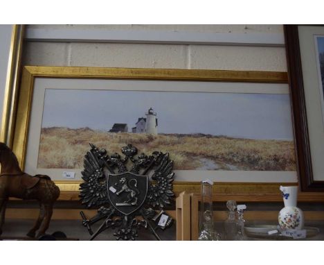 Lighthouse and cottage on the shore by Betsy Bennett, print, framed and glazed