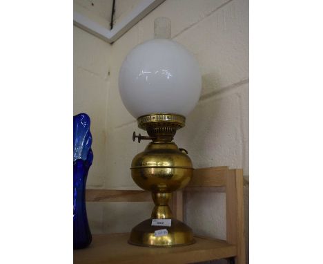 Oil lamp with white glass shade