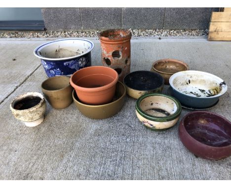 Glazed jardiniere and stand, Denby bowl, Poole pottery bowl and plate, various other pots, etc.