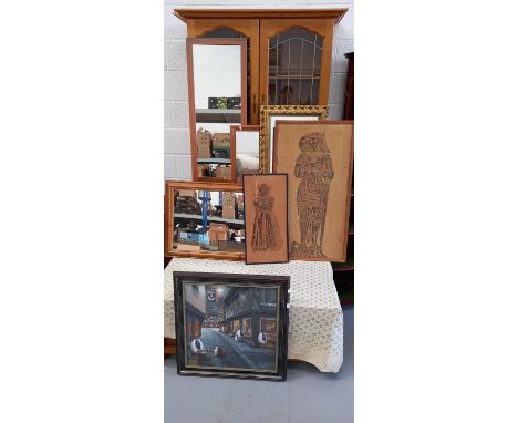 Four mirrors, two brass rubbings, and a humorous print.