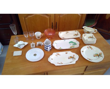 Two boxes containing a mix of ceramic and glassware items.