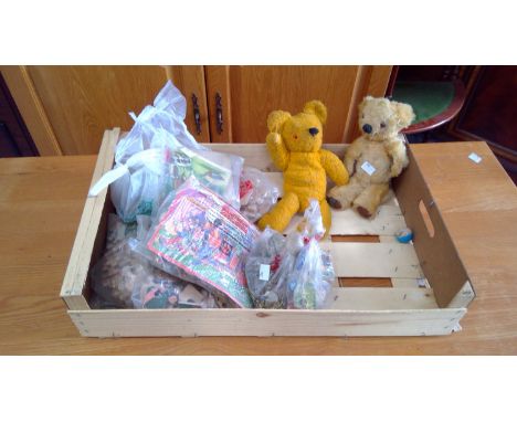 A box of young children's toys including a pair of vintage teddys, jigsaw puzzles, etc.