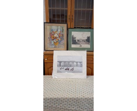A framed advertisement of Tehidy Estate, Camborne, together with a floral print and mounted photograph..