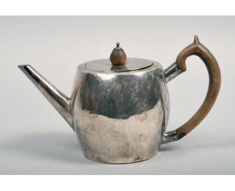 An early 19c Irish silver teapot with a straight pouring spout, hinge cover with wooden finial and handle, makers marks rubbe