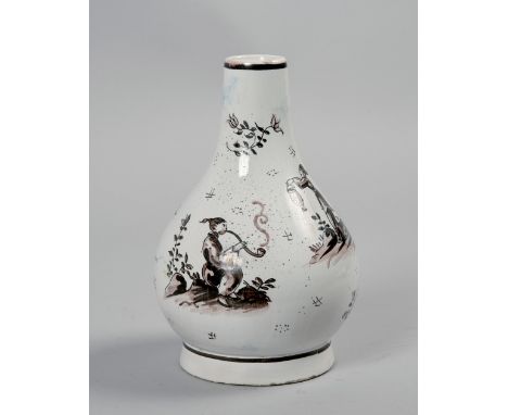 An 18c Delft bottle vase painted in manganese with Oriental figures on a white ground, these being an opium smoker and two po