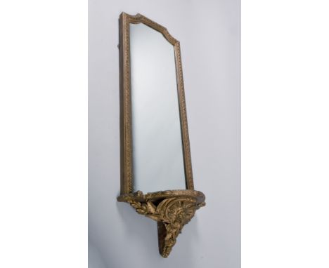 A 19c giltwood mirrorback wall bracket, 13in w, 39in h.