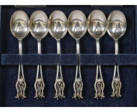 A boxed set of six Australian silver coffee spoons with opal set pierced feathered terminals, sterling with Australian makers