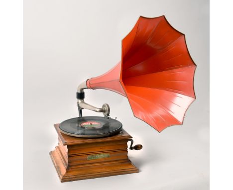 A 1920's American gramophone by the International Zonophone Co. in a stepped timber case with 10in diam turntable, the Zonoph
