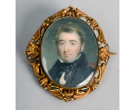 A 19c miniature portrait of a gentleman in a gilt brooch frame  and named Thomas Moffat, 1.75in x 1.5in.