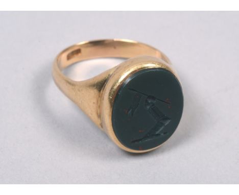 An 18c gold signet ring set with a bloodstone seal.