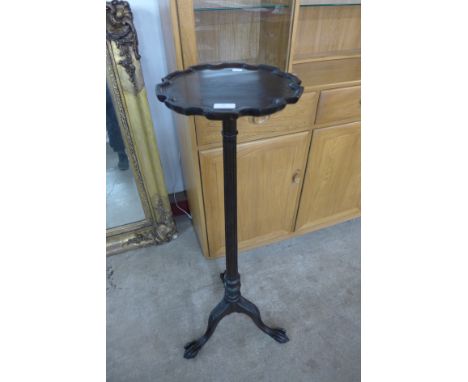 A Chippendale Revival mahogany jardiniere stand