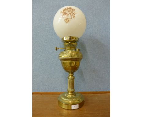 A Victorian brass oil lamp (converted for electricity)