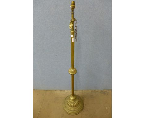 A Victorian Aesthetic Movement adjustable brass standard lamp