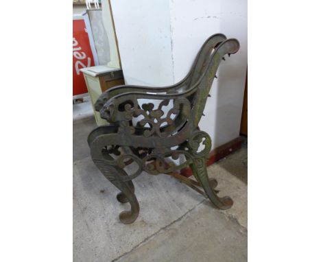 A pair of cast iron bench ends
