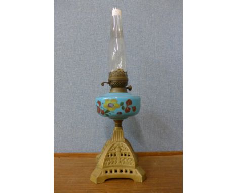 A Victorian brass oil lamp