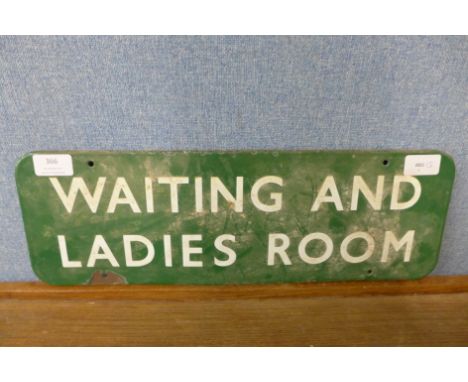 A Waiting and Ladies Room enamel sign